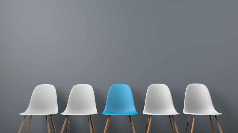 Row of chairs with one odd one out. Job opportunity. Business leadership. recruitment concept. 3D rendering