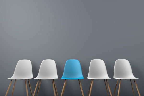 Row of chairs with one odd one out. Job opportunity. Business leadership. recruitment concept. 3D rendering