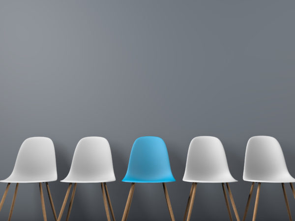Row of chairs with one odd one out. Job opportunity. Business leadership. recruitment concept. 3D rendering